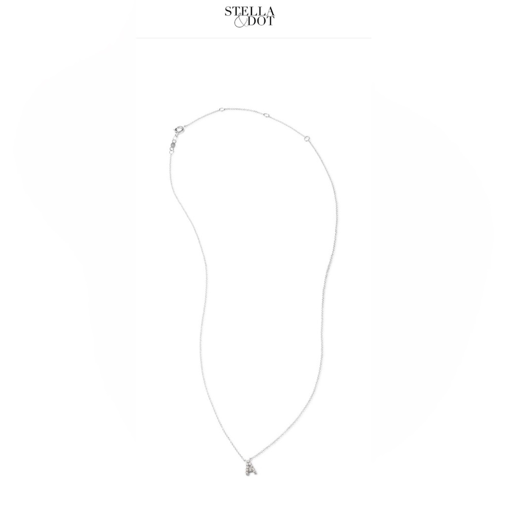 Stella and Dot Covet 14 KT white gold diamond initial necklace.